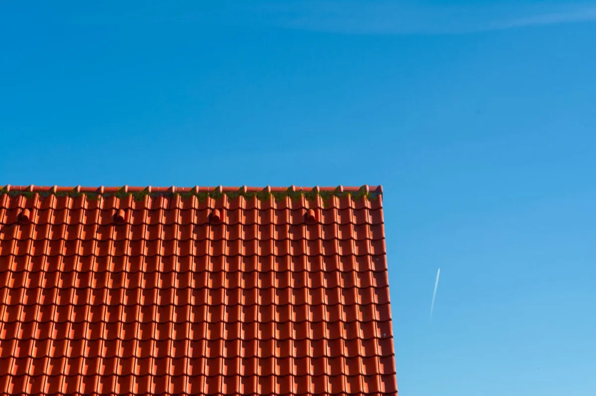 Tile roof gable in full sun, the kind of exposure that sets roof life in Springfield, MA